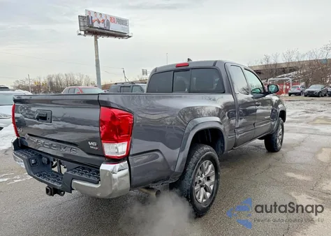 2016 Toyota Tacoma Access Cab z USA, uszkodzony, nr VIN 5TFSZ5AN2GX039907